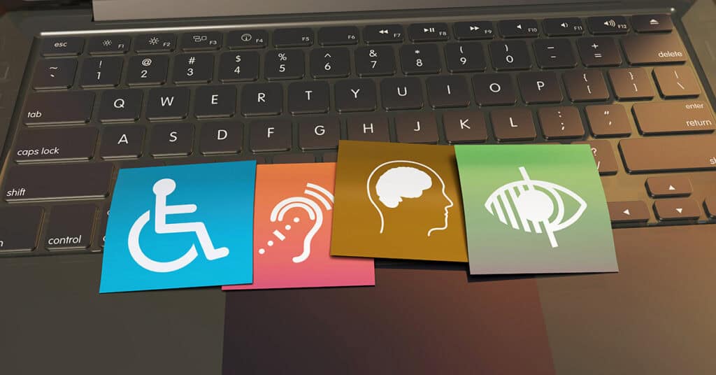 computer with access symbols for handicap, hearing, and sight to illustrate accessibility seo benefits