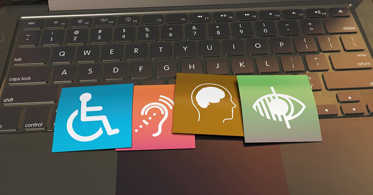 computer with access symbols for handicap, hearing, and sight to illustrate accessibility seo benefits