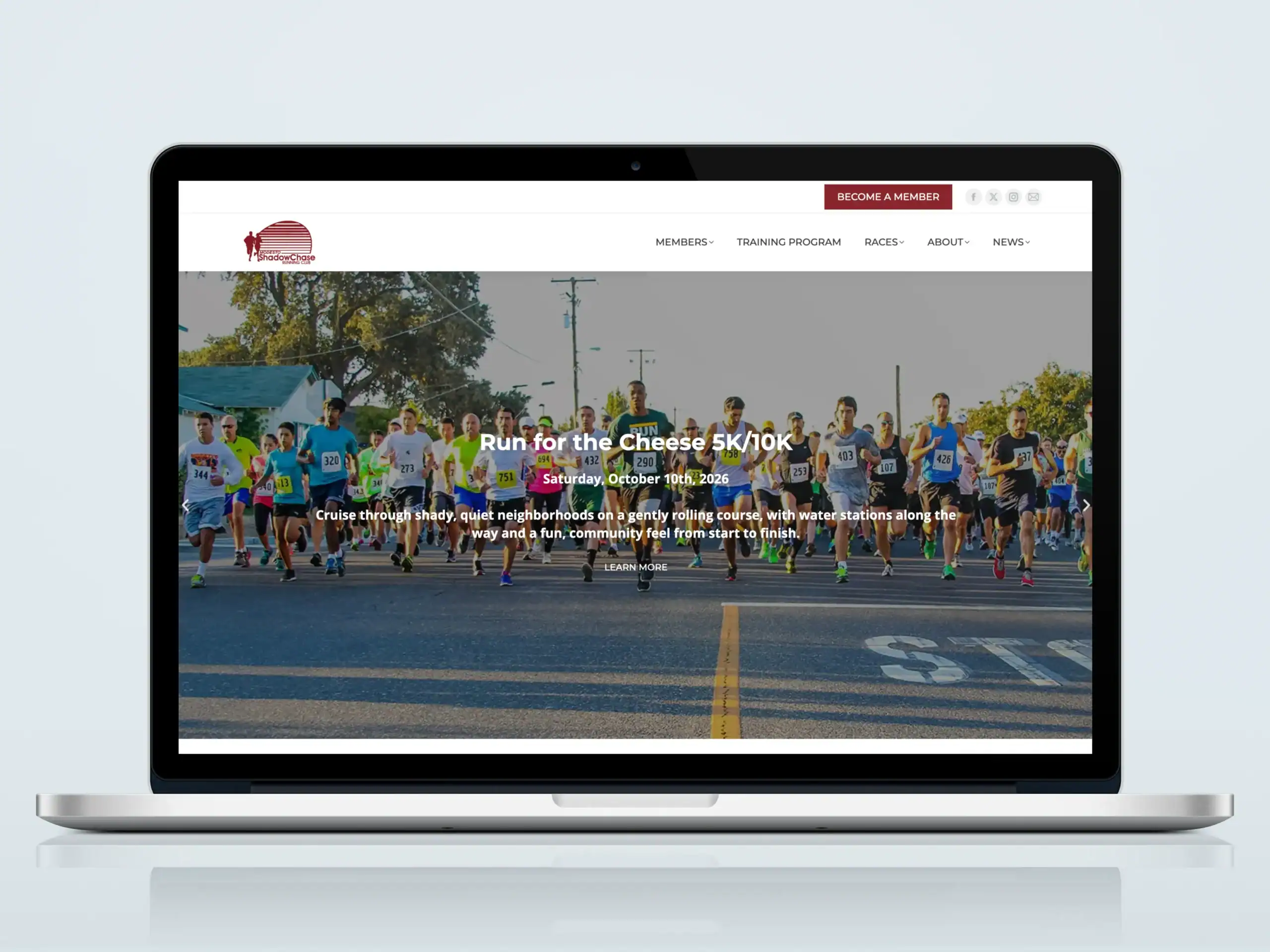 ShadowChase Running Club website homepage displayed on laptop