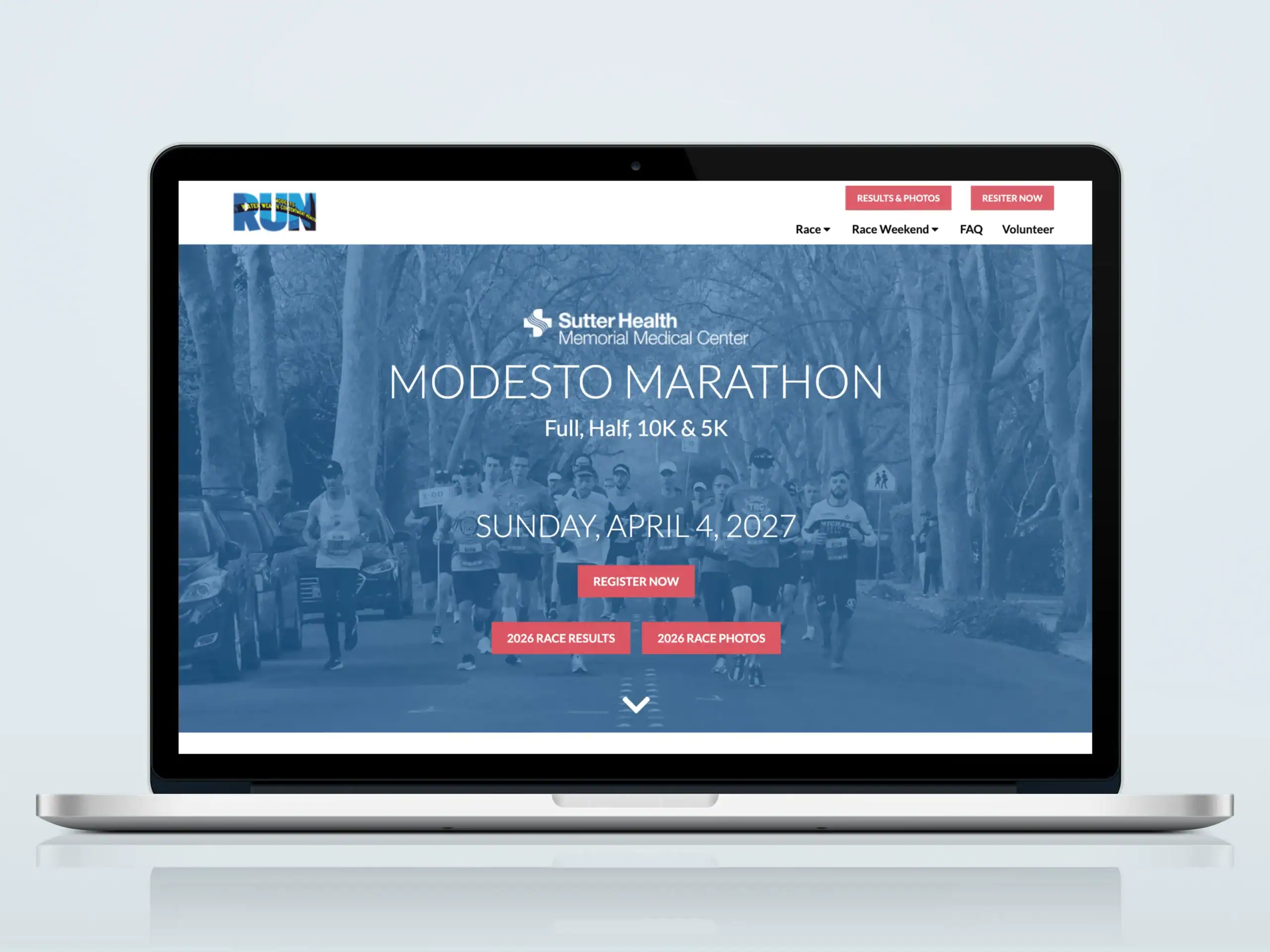Modesto Marathon website homepage on laptop mockup